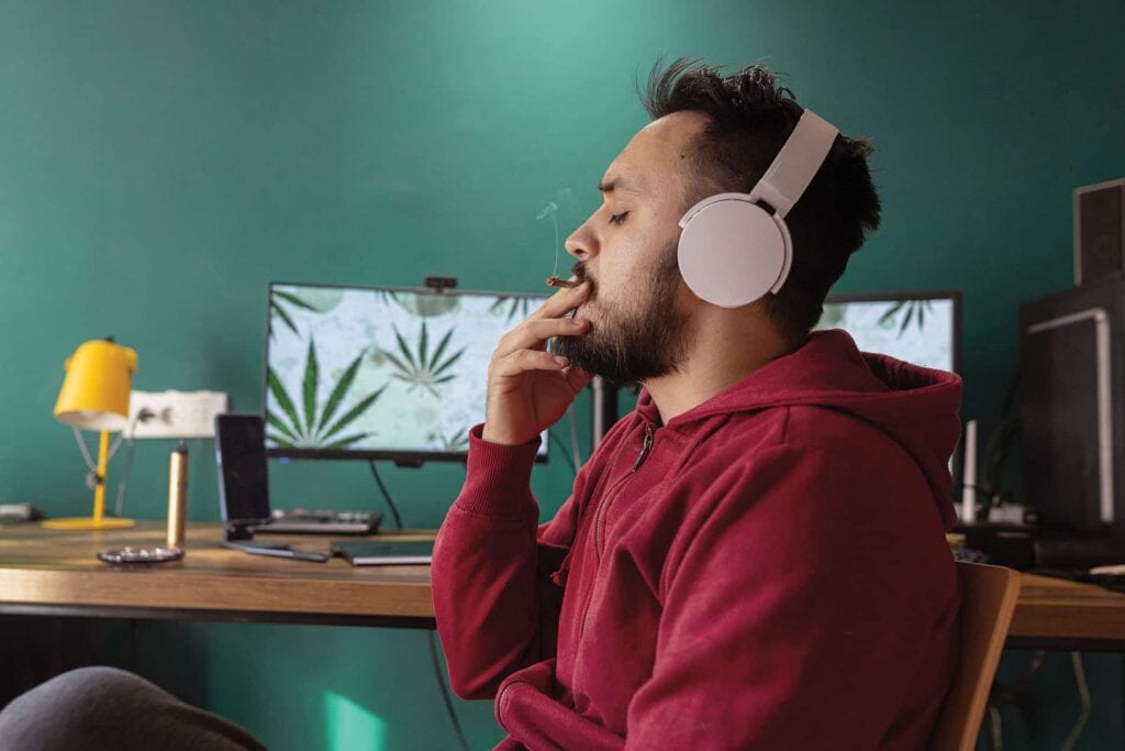 man smoking weed